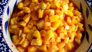 Mango-pineapple Salsa Chunky pineapple and mango in a citrus/chipotle marinade Simply delicious. Great on salmon!